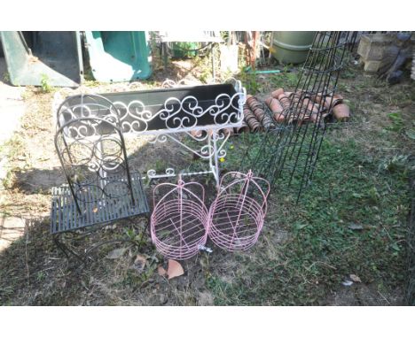 A QUANTITY OF METAL GARDEN ITEMS, to include a wrought iron rectangular planter on a stand, length 94cm, a pair of graduated 