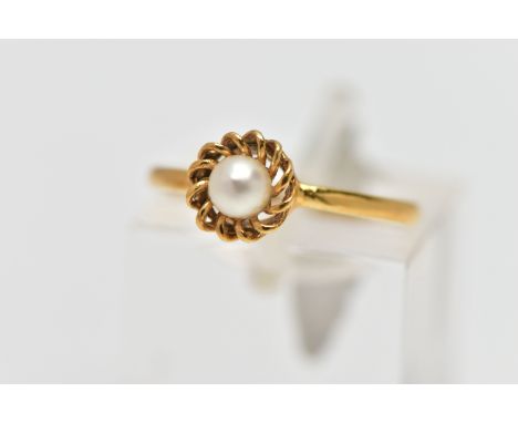 A 9CT GOLD CULTURED PEARL RING, single cultured cream  pearl with a slight pink hue, measuring approximately 3.8mm, within an