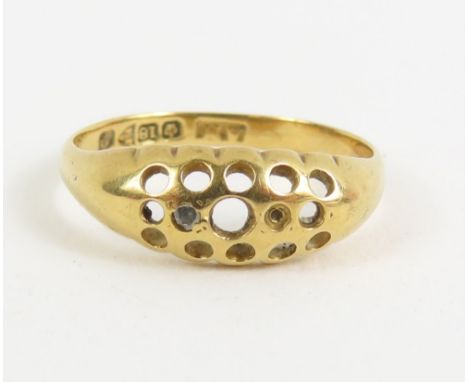 An Edwardian 18ct gold ring mount, Chester, with one small diamond still set in, finger size K 1/2, 1.8g gross