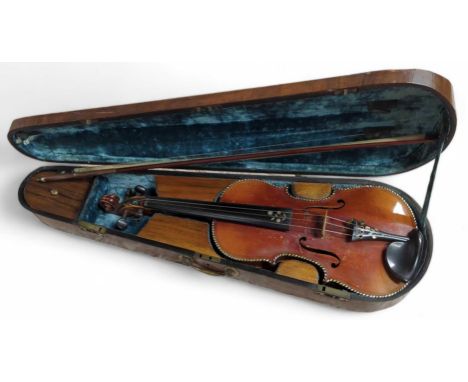 A German made violin with "Stradivarius" label inside,  the bridge marked 'A. Coad', the two piece back with inlaid mother of