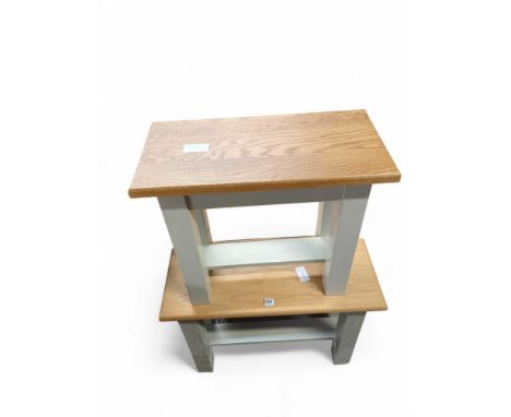 A low side table with light oak top and light green base, 55cm high; together with another smaller example