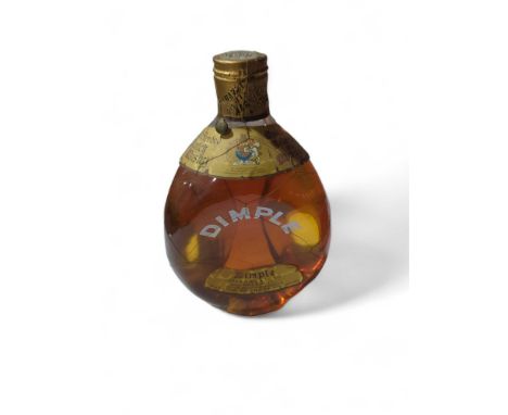 A bottle of Dimple scotch whisky