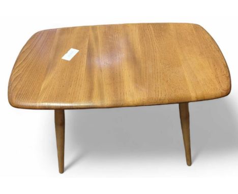 An Ercol light elm coffee table, on four tapering legs, 45cm high, top 73cm x 44cm