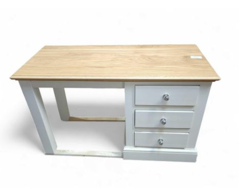A modern desk, with light oak top and cream lacquer base, and three drawers to one side, 67cm high, 111cm wide, 47.7cm deep
