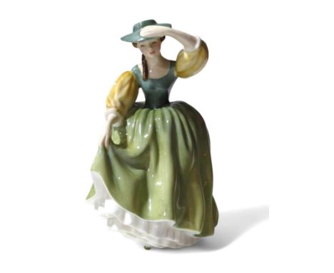 A Royal Doulton lady "Buttercup", 18.5cms high; A Crown Ducal Charlotte Rhead jug painted with a tree in autumnal hues on yel