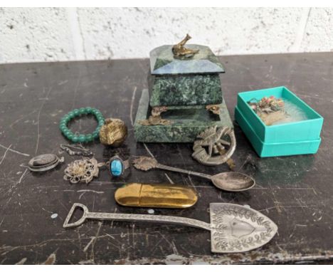 A green hardstone trinket box and ashtray, together with a bead necklace, spoons, and other items