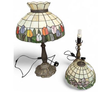 A Tiffany style lamp, the shade decorated with tulips; together with another similar example