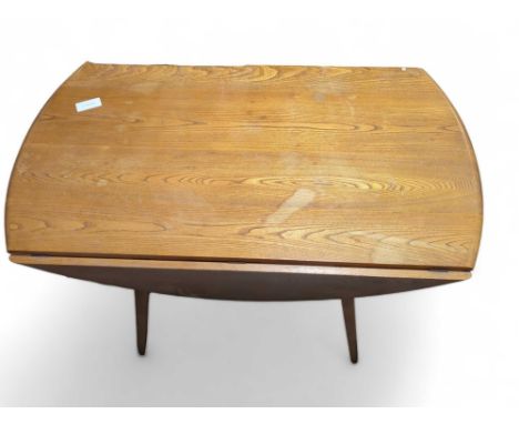 An Ercol light wood oval drop flap table on four square tapering supports, 110cms wide