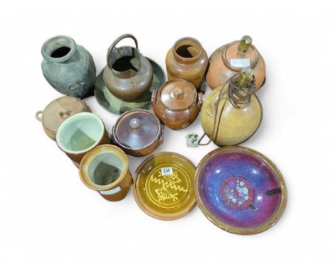 A quantity of pottery to include salt glazed stoneware storage pots, table lamp, glazed bowls, brass jug and other items