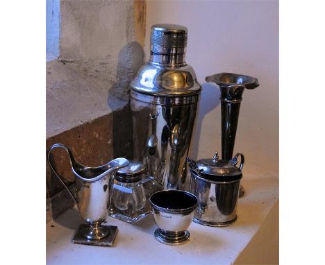 A collection of 6 silver and silver plate pieces: Silver hallmarked mustard pot with blue glass liner, Silver plate epris Coc