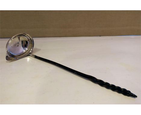 An C18th Georgian Old Sheffield Plate toddy ladle, having an oval bowl and turned and decorated whalebone handle, C1780.  L: 