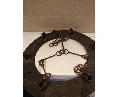 An antique wrought iron ceiling hung 6 light candle holder suspended on heavy chain Dia: 50 cm