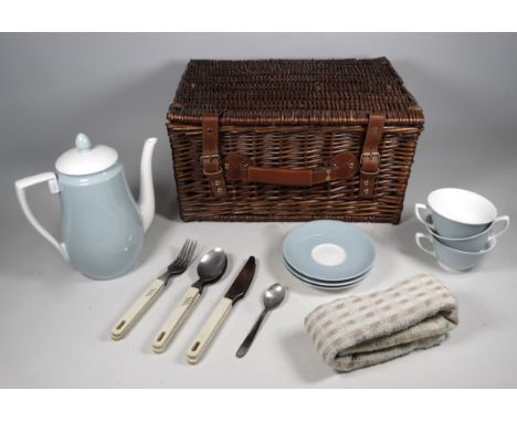 A large wicker basket - of oval form with hoop handle, width 56cm, together with a rectangular wicker hamper, including a tea