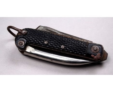 A World War II British army jack knife - dated 1941, with two blades, spike and lanyard ring.