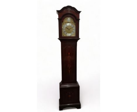 An early 20th century mahogany longcase clock - the case with floral inlay, the brass dial with silvered chapter ring set out