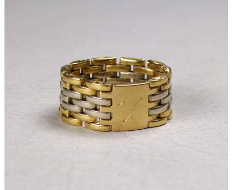 An 18ct bi-colour gold gatelink ring - with a plaque incorporating the initial 'A', weight 5.7g.