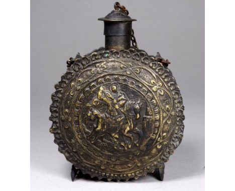 A late 19th/early 20th century Persian tinned brass powder flask - circular showing an image of St George and The Dragon, hei