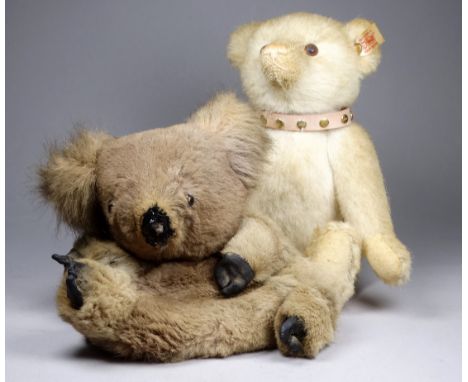 An early 21st century Steiff bear - white plush with pink studded collar, dated 2008, height 27cm, together with a koala glov