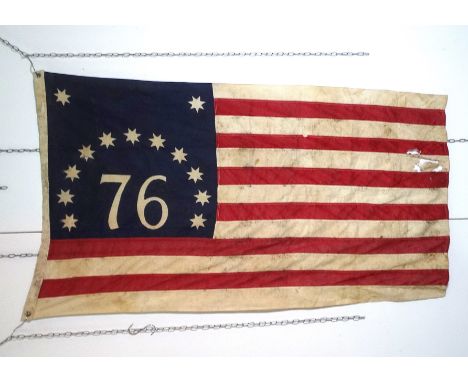 A Bennington flag - stitched cotton with printed quadrant, 82 x 123cm, together with a copper and brass powder flask with rep