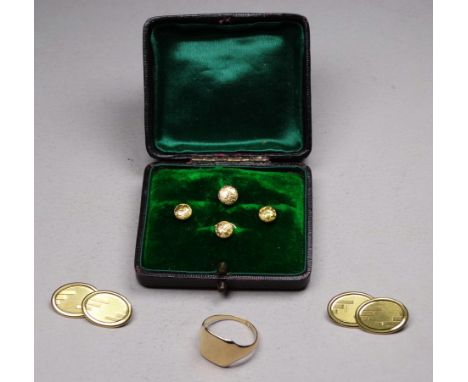 A pair of 9ct gold cufflinks - oval buttons with geometric engraving linked by chain, together with a boxed set of 9ct gold s