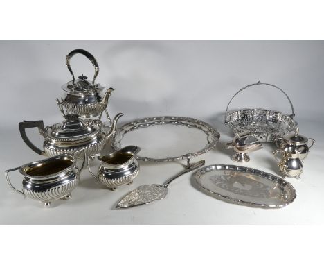 An early 20th century four piece silver plated tea service - part gadrooned with ebonised fittings, comprising a kettle and s