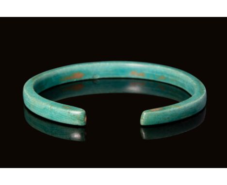 Ca. 600 - 400 BC An elegant Celtic bracelet crafted from cast-bronze. The bracelet features a round hoop with a polygonal sec