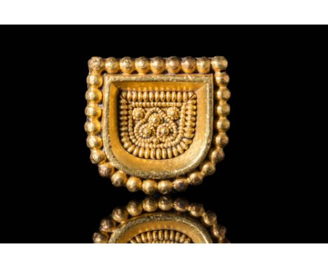 Ca. AD 1000 - 1100 A beautiful Viking 23 ct gold belt applique with a ‘D’ shape. The applique has a symmetrical geometric com