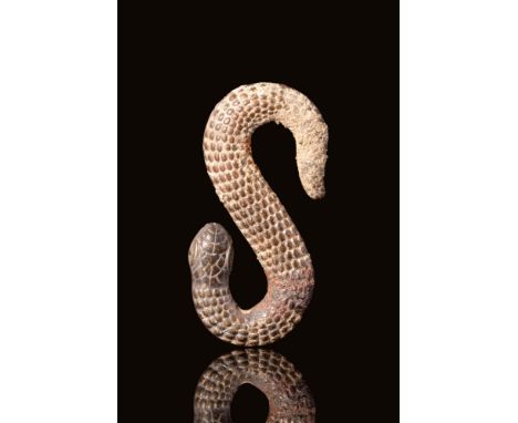 Ca. AD 1500 - 1600 This beautiful snake-shaped pendant or hookup is formed from a single strip of bronze. A naturalistic snak