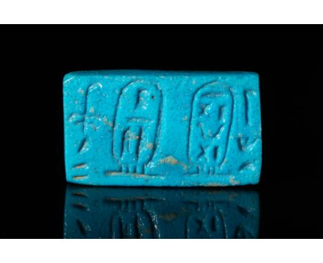 Ca. 754 - 656 BC A rare Egyptian rectangular blue-glazed tile with two cartouches. The left cartouche is of the Nubian Pharao