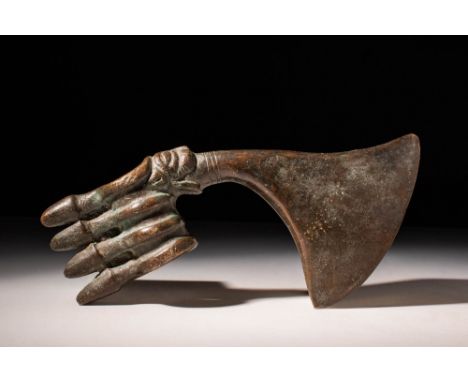 Ca. 1200 - 900 BC A Western Asiatic bronze axe-head with an imposing vertical blade edge extending from a lengthy neck embell
