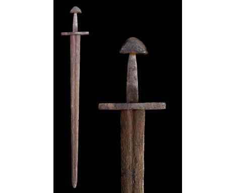 Ca. AD 1050 - 1250 A medieval forged iron sword with a ‘tea-cosy’ pommel and a square, straight crossguard. In Ewert Oakeshot