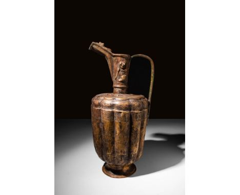 Ca. AD 1100 - 1300 An amazing Khorasan copper alloy ewer, made of hammered copper alloy with beasts in relief on the spout, n
