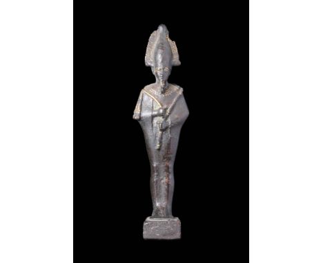 Late Period, Ca. 664 - 332 BC An Egyptian gold inlaid bronze figurine of Osiris, god of the underworld, standing in mummified