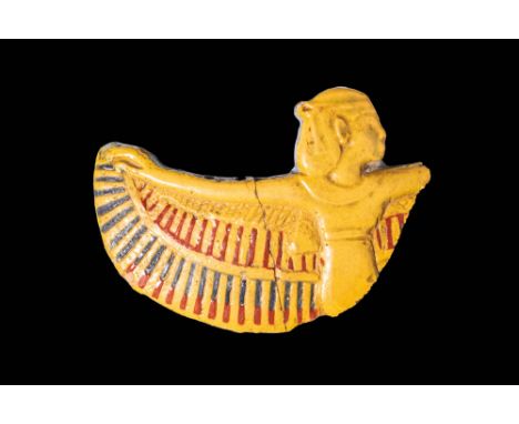 New Kingdom, 18th to 20th Dynasty, Ca. 1550 - 1069 BC A winged goddess-shaped pectoral made of yellow faience. The front side