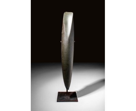 Ca. 6000 - 4000 BC A unique Neolithic axe head of pyriform shape, smoothly hand-carved from a dark grey stone. The ancient im
