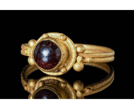 Ca. AD 300 - 700 A stunning Byzantine gold finger ring with an elegant double round hoop. The external surface is decorated w