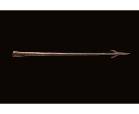 Ca. 300 BC - AD 200 A large Roman iron pilum spearhead with a barbed, triangular blade, a long and narrow neck, and a cone pr