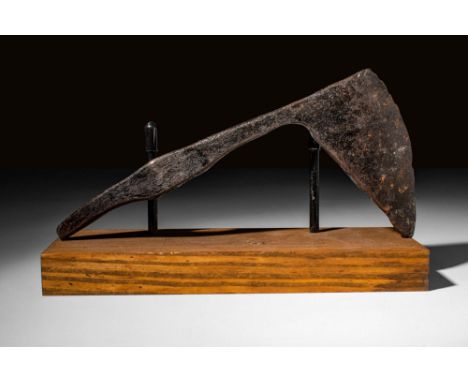 Ca. AD 600 - 800 A long iron Viking or Anglo-Saxon double-headed axe. The axe has a central socketing shaft. The back end dis