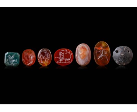 Ca. AD 1800 - 1900 An attractive ensemble of five intaglios, one cameo and a stone pendant with different shapes and subjects