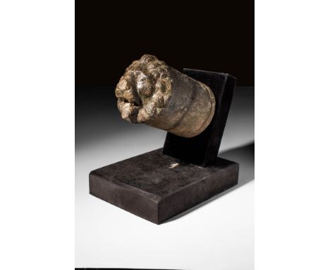 Ca. AD 100 - 300 A Roman bronze spout, possibly from a chariot, in the form of a lion's head. Proud and fierce with a curly, 