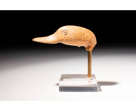 New Kingdom, 18th to 20th Dynasty, Ca. 1550 - 1069 BC A charming Egyptian bone duck head with rounded eyes and a long curved 