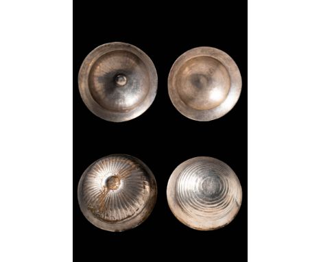 Ca. 500 - 400 BC A pair of Greek silver phiale, which are a type of libation bowl used for holding wine during special ceremo
