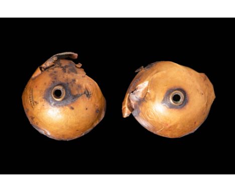 Ca. 1720 - 1630 BC A pair of Egyptian gold, hollow hemispheric cylinder seal finials. There is a central hole to set up for t