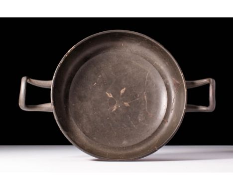 Ca. 400 - 300 BC A beautiful Xenon ware kylix with a classic shape and a stunning decorative motif. These motifs are painted 