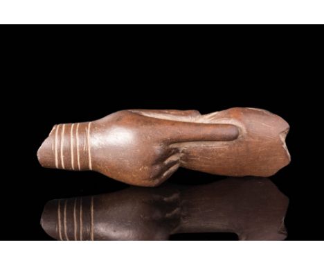 Ca. 1550 - 1069 BC A beautiful, delicate fragment of a teardrop-shaped wooden spoon. It has a miniature hand with a wrist ado