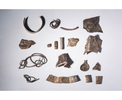 Ca. AD 800 - 1100 An extensive collection of eighteen Viking-era silver artefacts, including bracelets, rings, pendants, bead