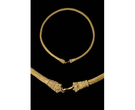 Ca. 300 - 100 BC A beautiful Hellenistic gold necklace. It is formed of four gold braided wires in a “rope” pattern, twisted 
