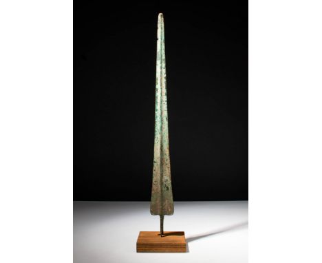 Ca. 1000 - 800 BC A Western Asiatic spearhead of a leaf-shaped form with shoulders and an elongated blade, cast in a single p
