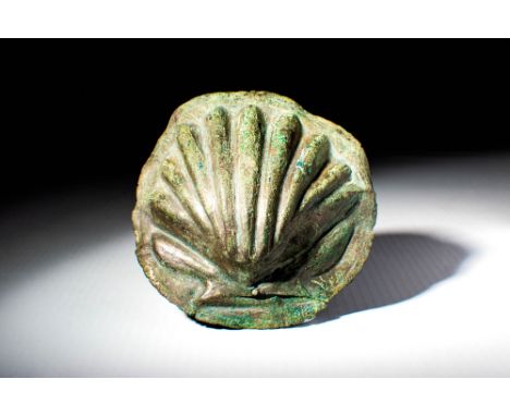 Ca. AD 100 - 300 A Roman bronze element of a chariot in the shape of a shell. This piece has amazing details on a large body 