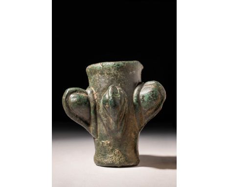 Ca. 1200 - 800 BC An elegant Western Asiatic bronze mace head composed of a cylindrical socket body embellished with five pro